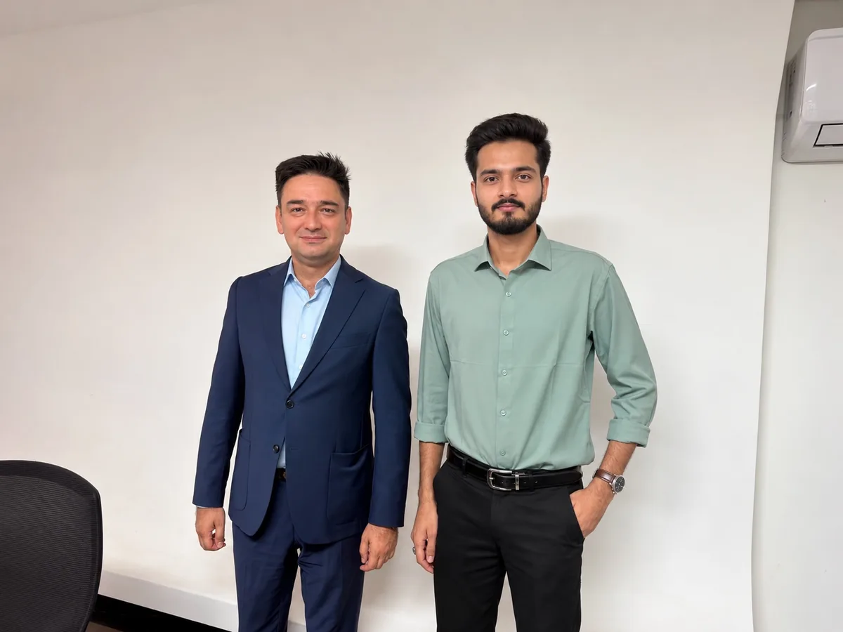Mr. Farid and Daim Ali standing together after their archery-kit meeting in Baku